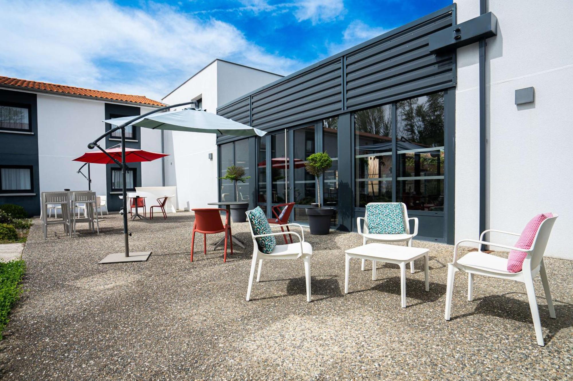 Sure By Western Les Portes De Hotel